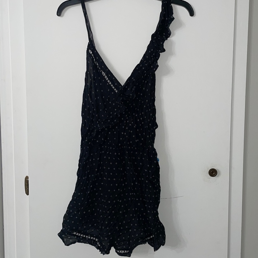 Free people black romper size medium NWT